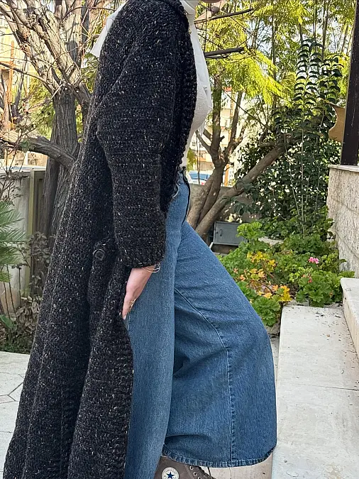 Black longline cardigan with wide-leg jeans