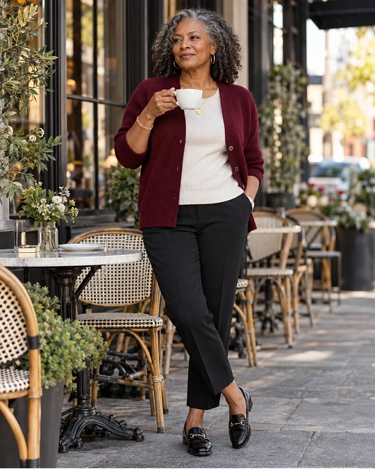 Colorful cardigan styled with familiar neutral wardrobe pieces