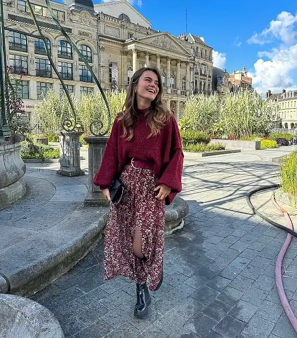 Burgundy knit sweater with floral midi skirt