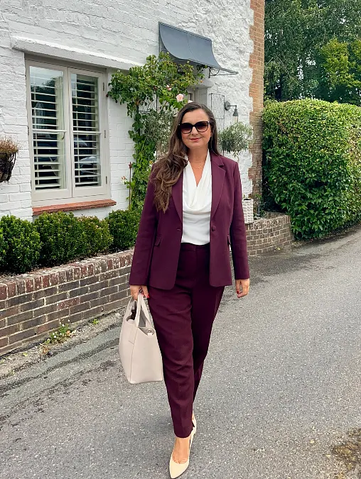 Burgundy suit with ivory blouse