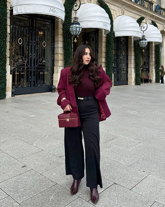 Burgundy blazer with black wide leg trousers