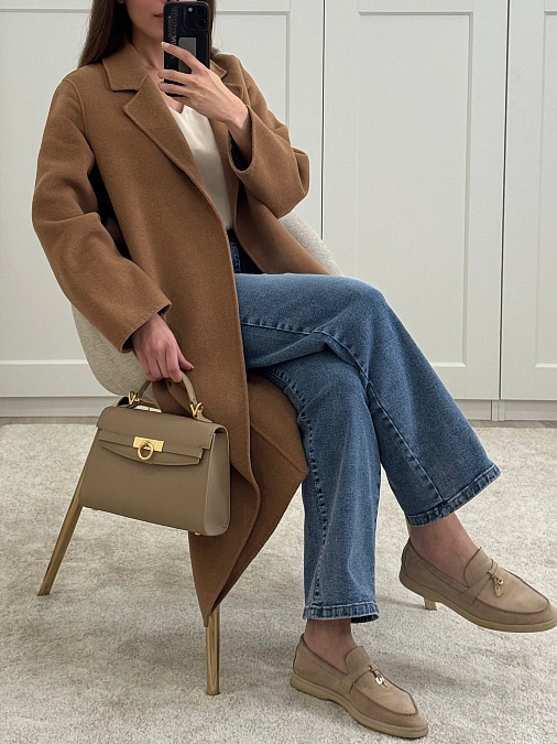 Camel coat with denim and loafers outfit for women over 50