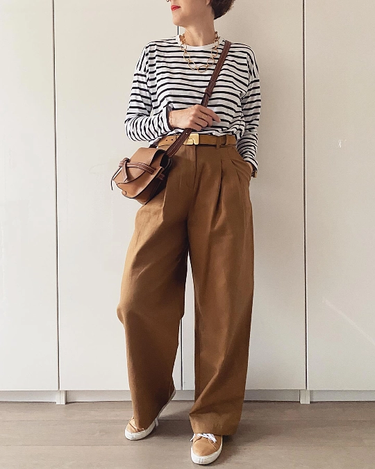 Striped top with camel wide-leg trousers