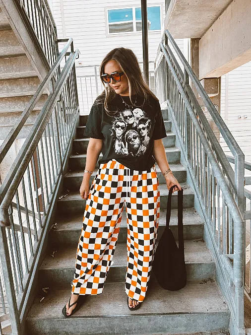 Graphic Tee With Orange Check Pants