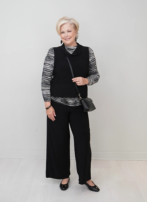 Black Sweater Vest and Wide-Leg Trousers
