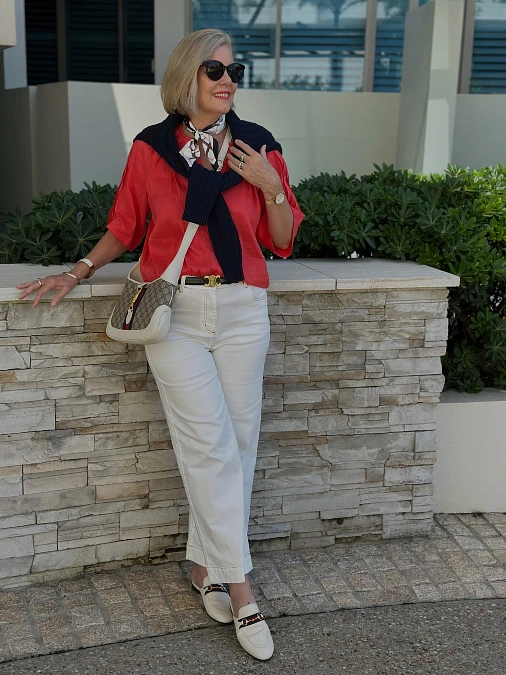 Coral Blouse and Cream Trousers