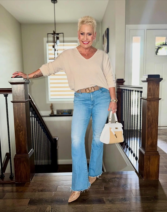 Cream Sweater and Flared Jeans