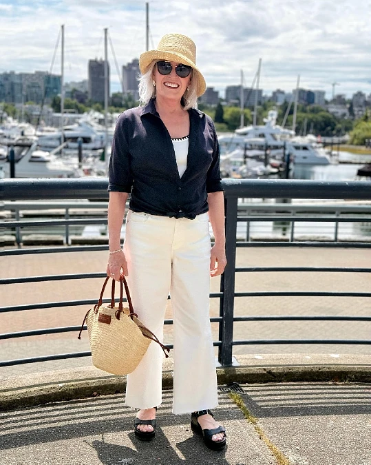 A Tied Navy Shirt and White Jeans