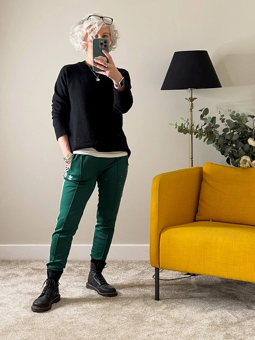 Black Sweater and Green Track Pants