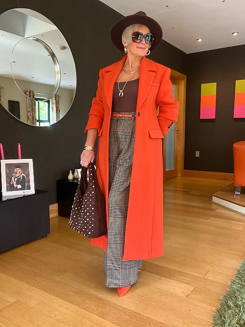 Orange Coat With Plaid Trousers