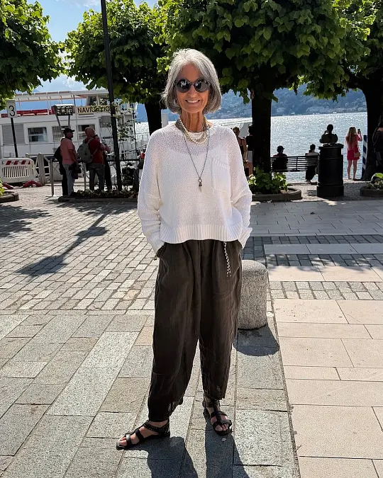 White Knit and Relaxed Black Trousers